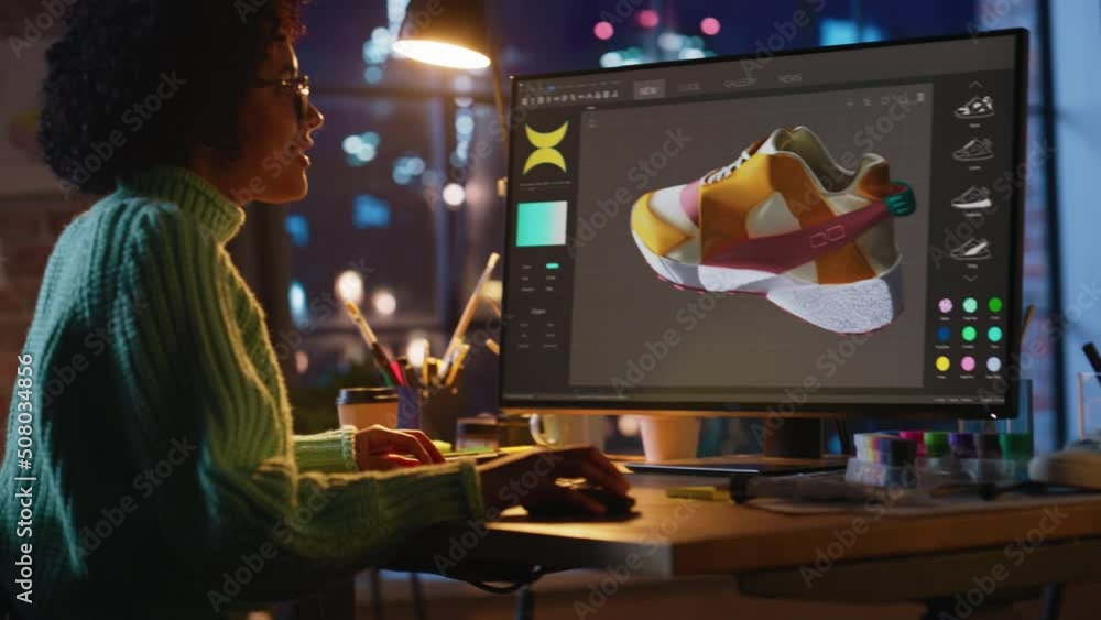 Poster Black Teen Woman Creating and Rendering 3D Model of Unique Sneaker at Personal Computer During Work at Evening. Freelance and Millennial People Concept