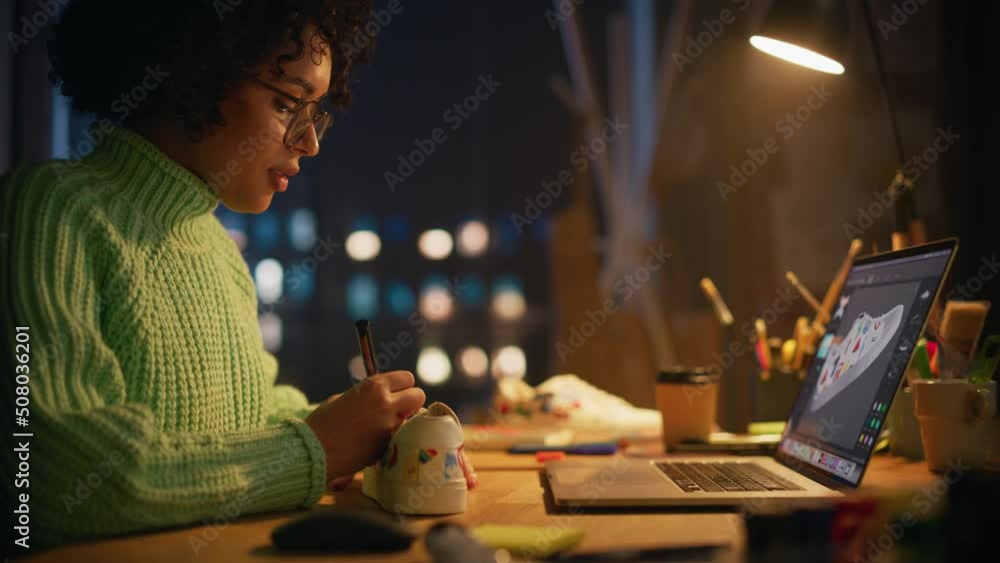 Poster female designer puts patterns on shoe comparing with 3d model on the laptop screen. black woman feel