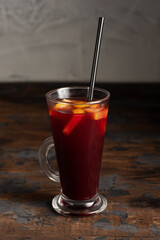 Mulled wine, alcoholic and non-alcoholic mulled wine on a wooden background