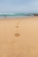 footprints on the beach