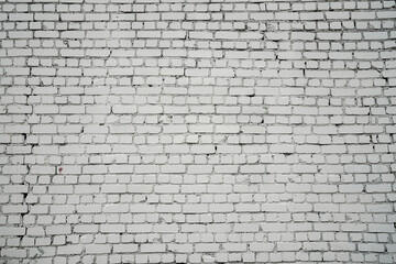 Large and long empty white aged brick wall front view outdoor of urban street. Brickwork background.