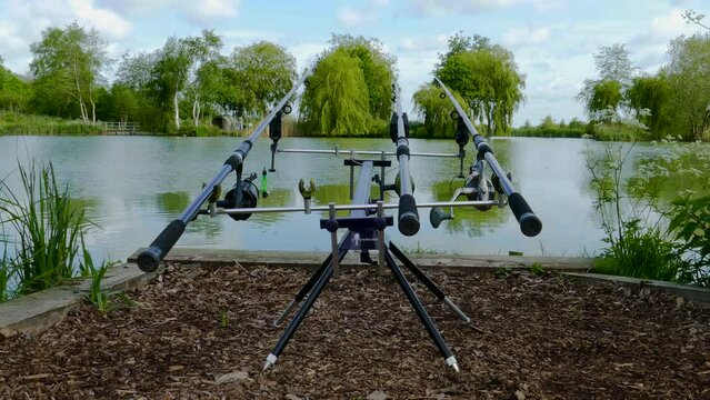 Carp fishing. Rods on a rod pod with the swingers attached ready to catch some fish at Weybread lake
