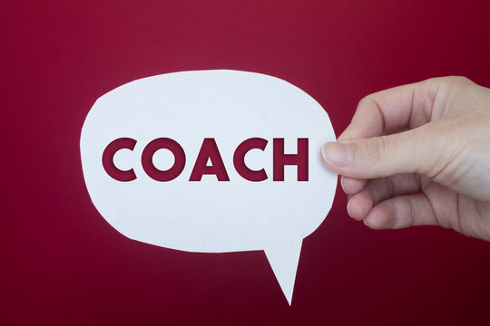 Speech bubble in front of colored background with Coach text.
