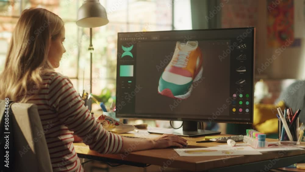 Leinwandbilder teenage female footwear designer rotate 3d model of shoe and change colours on it while working on d