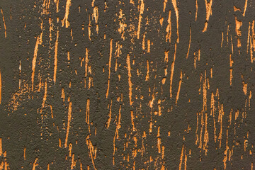 Orange or brown abstract pattern plaster bark beetle stucco texture background
