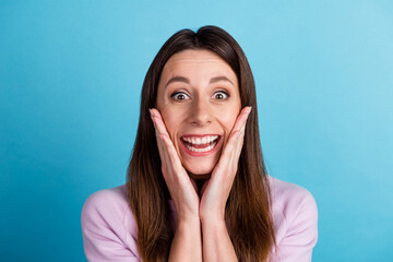 Photo of young excited woman arms touch cheeks glas discount advertise isolated over blue color background