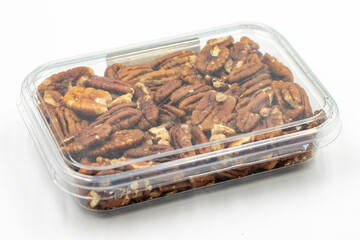 Pecan walnut. Packed pecan walnuts on white background. close up