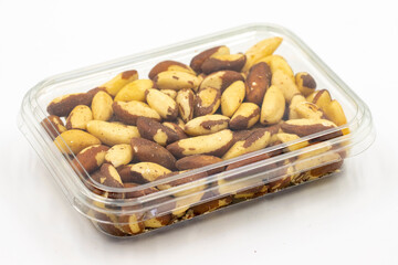 Brazil walnut. Packed Brazil walnut on white background. close up