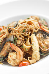 mixed seafood traditional stir fry laksa curry in malaysia