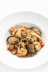 mixed seafood traditional stir fry laksa curry in malaysia