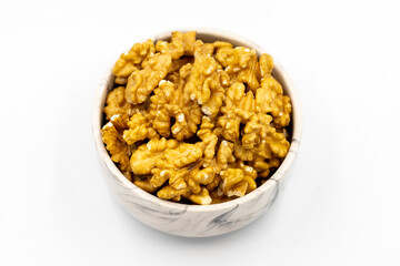 Fototapeta premium Walnut on white background. Close-up walnut kernel