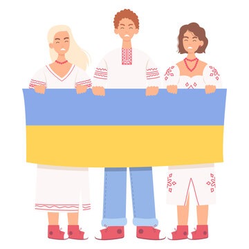 Young people in national costume holding Ukrainian flag. Riot, demonstration to support Ukraine and stop war. Strike, protest, activism movement. 