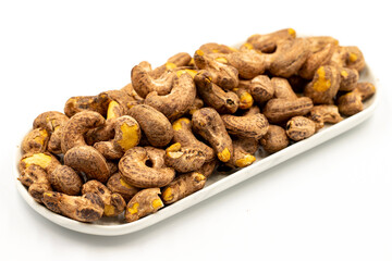 Shelled cashew on white background. Close-up of fresh cashews