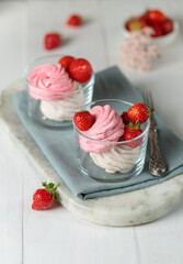 Natural dessert, homemade fruit marshmallows in cups, decorated with fresh strawberries