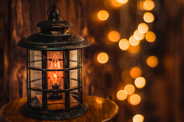 christmas lantern on a wooden background