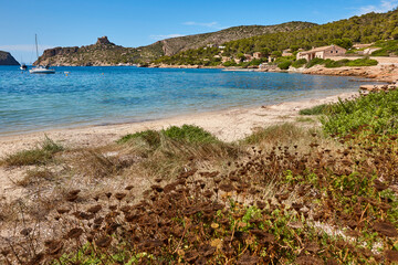 Fototapeta na wymiar Turquoise waters in Cabrera island shoreline landscape. Balearic archipelago. Spain
