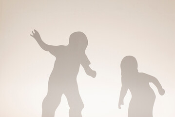 silhouette of a child playing figure