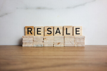 Word resale from wooden blocks. Second hand shopping, thrift concepts