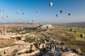 hot air balloon against blue sky above Cappadocia