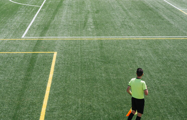 Soccer lineman attentively watching the match with copy space. soccer concept