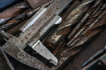 old vintage hand tools - set of drills and old caliper on a iron background