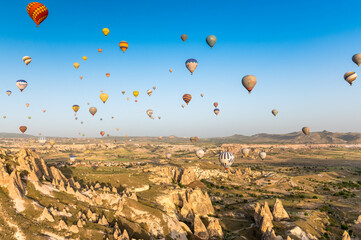 hotair ballons in the morning sky above Cappadocia