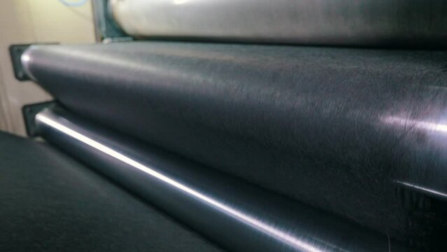 Production of agrofibre at the factory. Agrofibre on the conveyor line close-up. Agrofibre production process