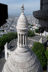 View from Sacre Coeur over Paris with one tower of the cathedral in center