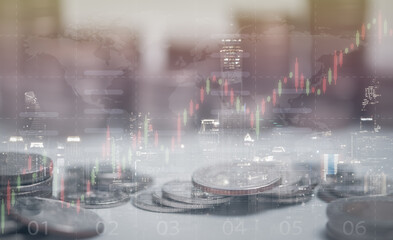Double exposure of city and rows of coins for money, finance and saving, business concept.