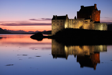 Fototapeta na wymiar Eilean Donan castle at sunset in the Highlands, Scotland
