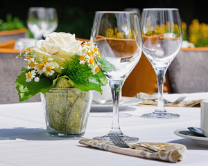 laid table in summer in nature. Restaurant with terrace.