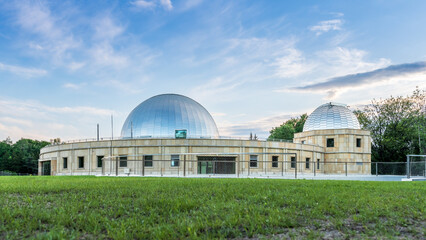 Silesian planetarium after renovation. The dome of the Silesian planetarium shining in the light of...