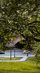 View on the street with cars under a bridge