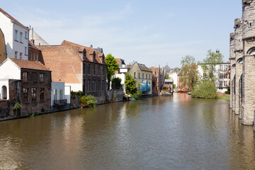 Fototapeta na wymiar View of Ghent historic center, castle Gravensteen, Leie river on a sunny day.