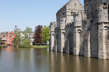 Fototapeta na wymiar View of Ghent historic center, castle Gravensteen, Leie river on a sunny day.