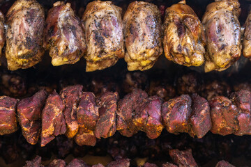 Pork shanks on the grill, closeup, outdoor picnic.