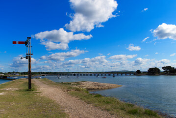 Langstone Harbour and the old Railway signal from the old Billy Line disused railway bridge photo.