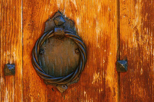 metal knocker on the door in the detail