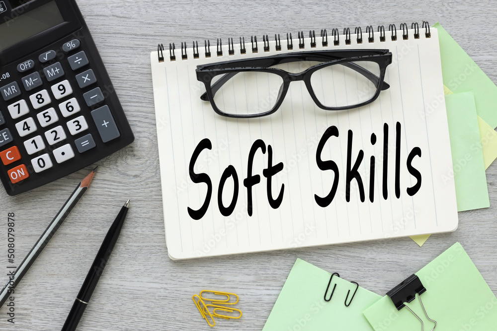 Poster soft skills. open notepad notebook with text. glasses on a notebook. bright stickers