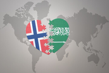Obraz premium puzzle heart with the national flag of norway and saudi arabia on a world map background. Concept.