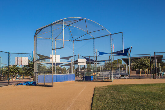 A baseball field batting cage.