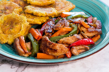 Chopped steak or Bistec Picao and patacones or tostones are fried green plantain slices, made with green plantains, Typical latin food, Panamá, Central America