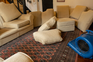 England, UK. 2022. Industrial size air blower drying carpet, furniture and cushions which have been cleaned.