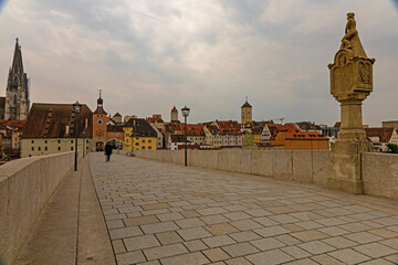 view over stony bridge to downtown Regensburg
