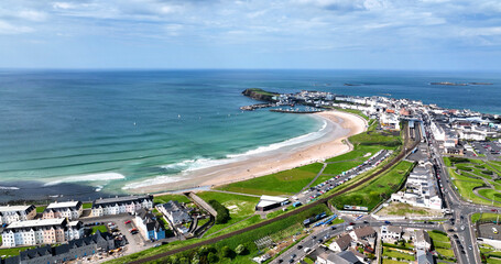Fototapeta na wymiar Aerial view of Portrush Beach Atlantic Ocean North Coast County Antrim Northern Ireland by Drone