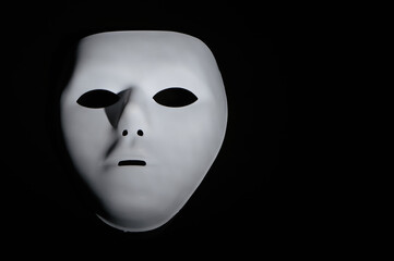 Anonymous mask isolated on a black background