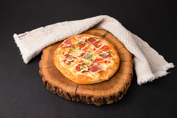 Homemade pizza, pizza on a black background, Georgian cuisine
