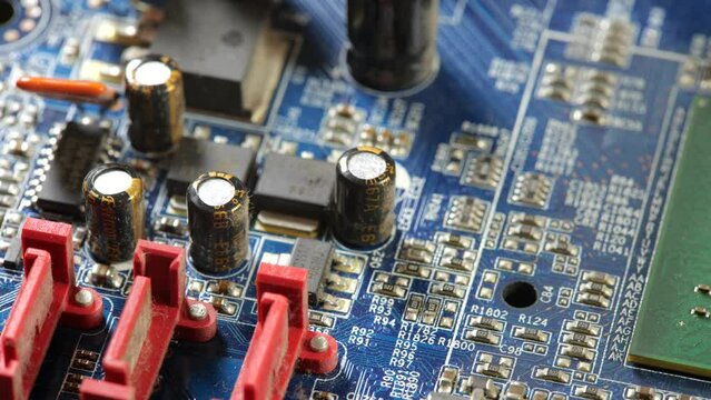 Computer electronics manufacturing industry, motherboard complex circuitry, generic circuit board electrical parts components macro, object detail, extreme closeup, shallow dof, nobody, technology