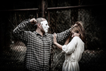 A serial killer scene is about to kill an Asian woman,concept thriller scene,Halloween festival