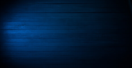 Blue wooden table background wood texture. Dark blue rustic plank surface. Panoramic high...